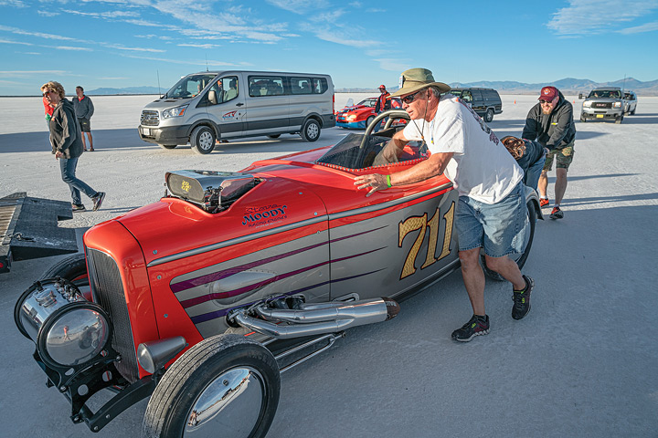 At the starting line of the Long Course, drivers prepare a 1932 Ford Roadster to race on the salt. 